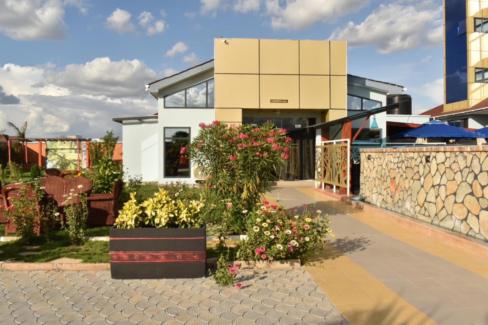Brand Hotel Додома Экстерьер фото